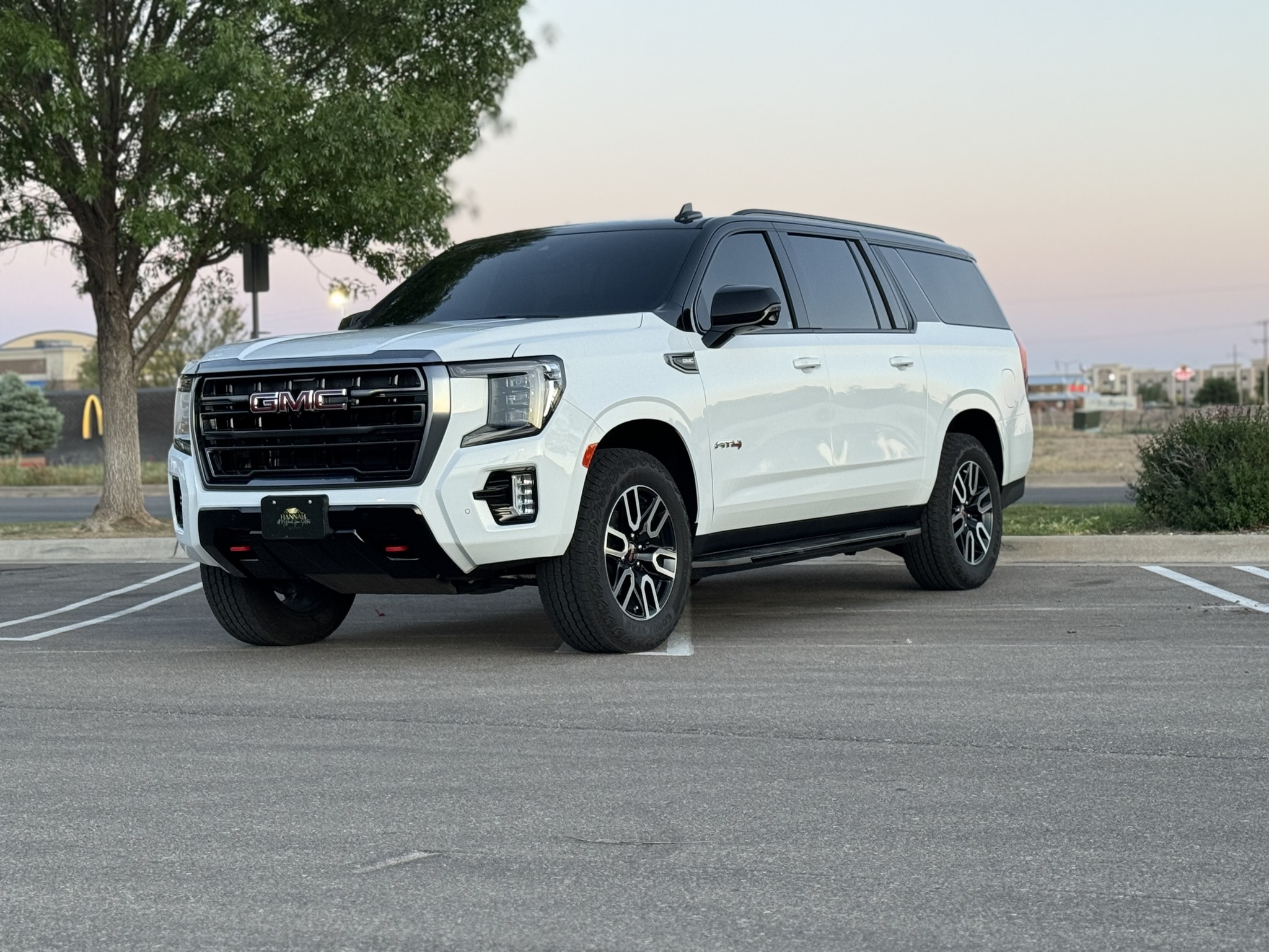 GMC Yukon AT4 tuxedo wrap — black roof on white body